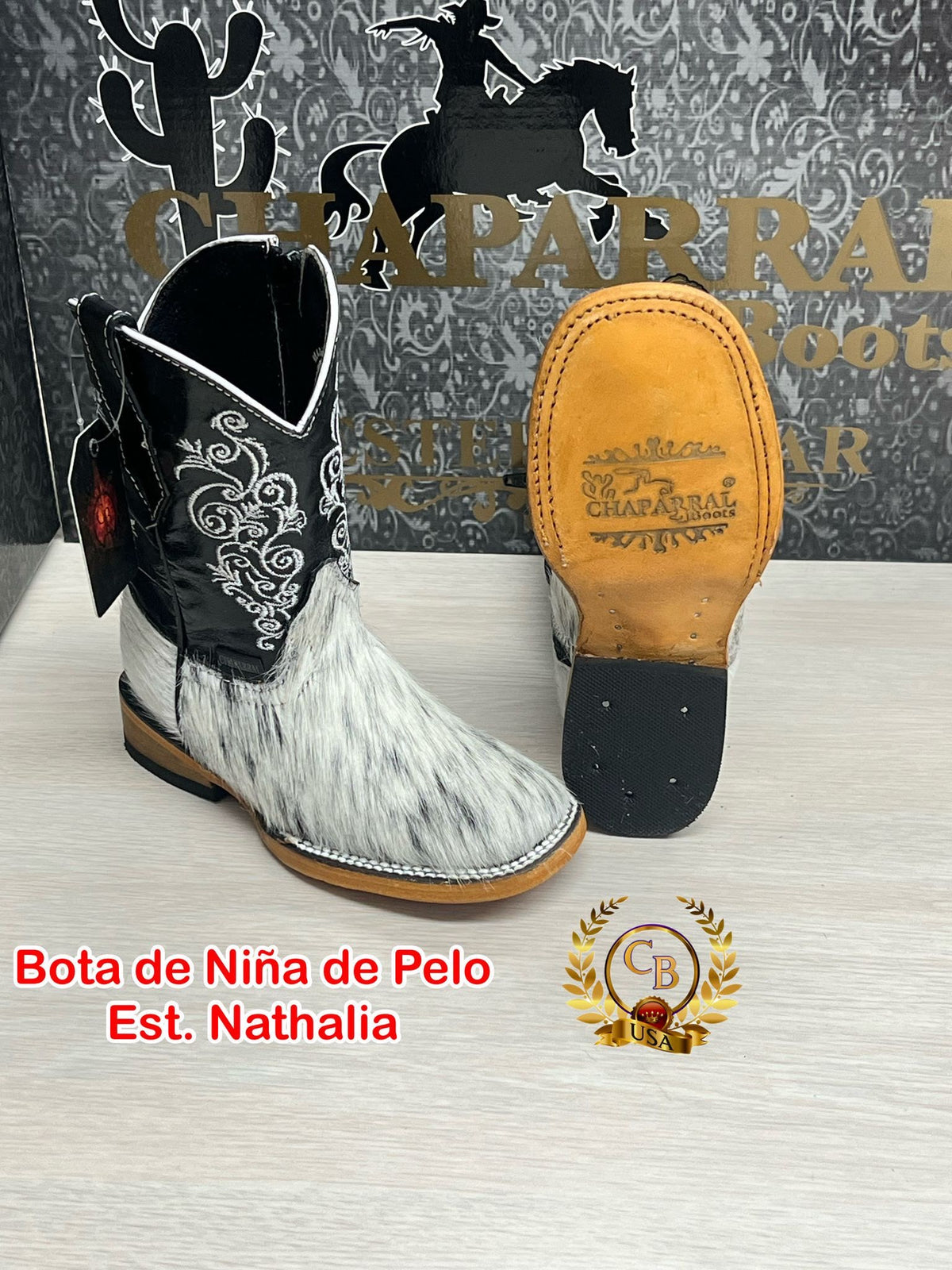 Bota de niño, pelo de vaca